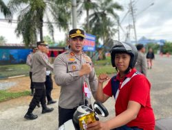 Jelang HUT RI ke-80, Polres Kubu Raya Bagikan 100 Bendera Untuk Pengendara